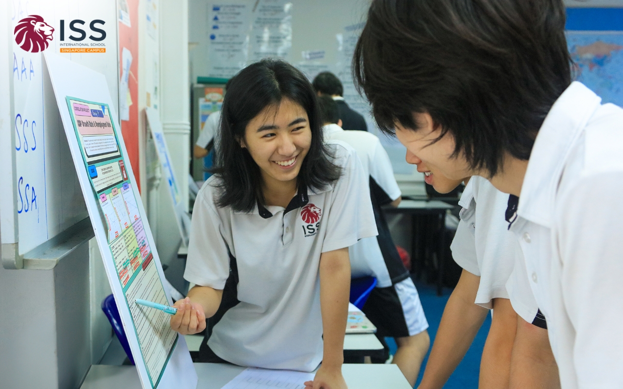 teacher guiding students on their learning journey