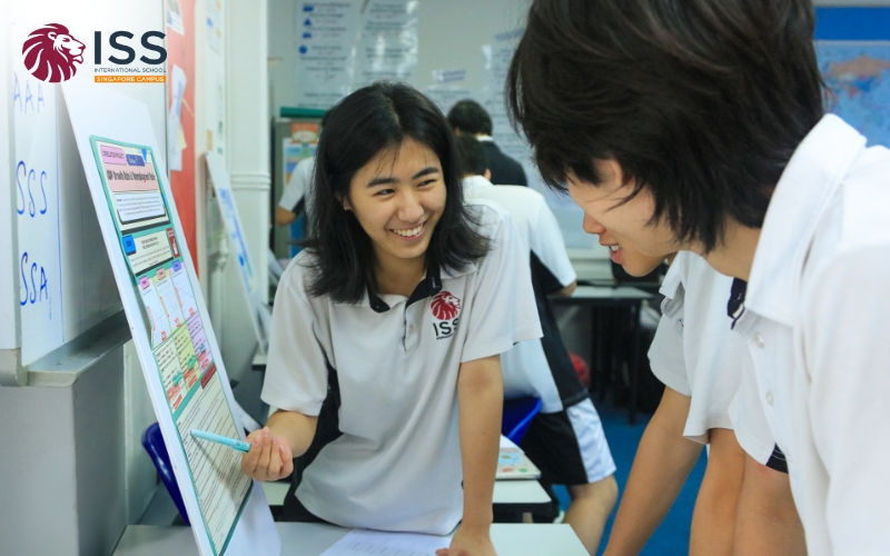 teacher guiding students on their learning journey